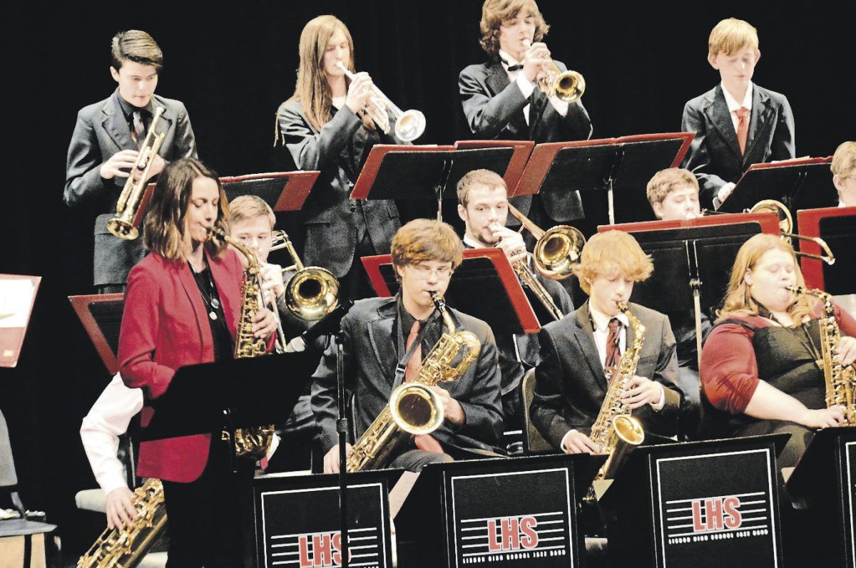 Former Lisbon music teacher and guest artist Jen Tiede plays saxophone with the jazz band during the guest artist concert.