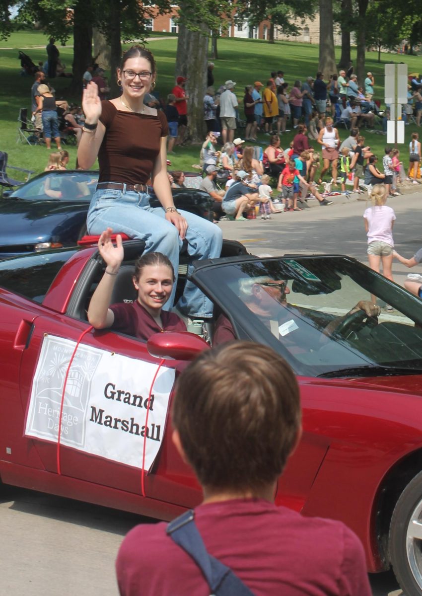 Grand Marshalls Jackson Jaspers and Rebecca Conrad ride at the front of the Heritage Days parade Saturday, July 13. 