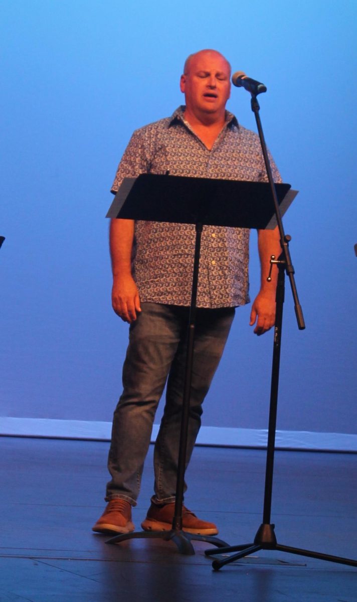 Daryl Becicka performs a number during the celebration of 100 years in theater Friday, July 12.