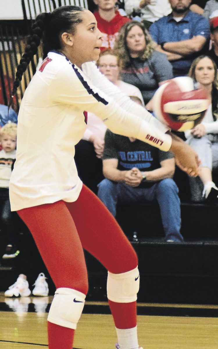 Mykala Luzum-Selmon receives a serve from West Branch in play last season.