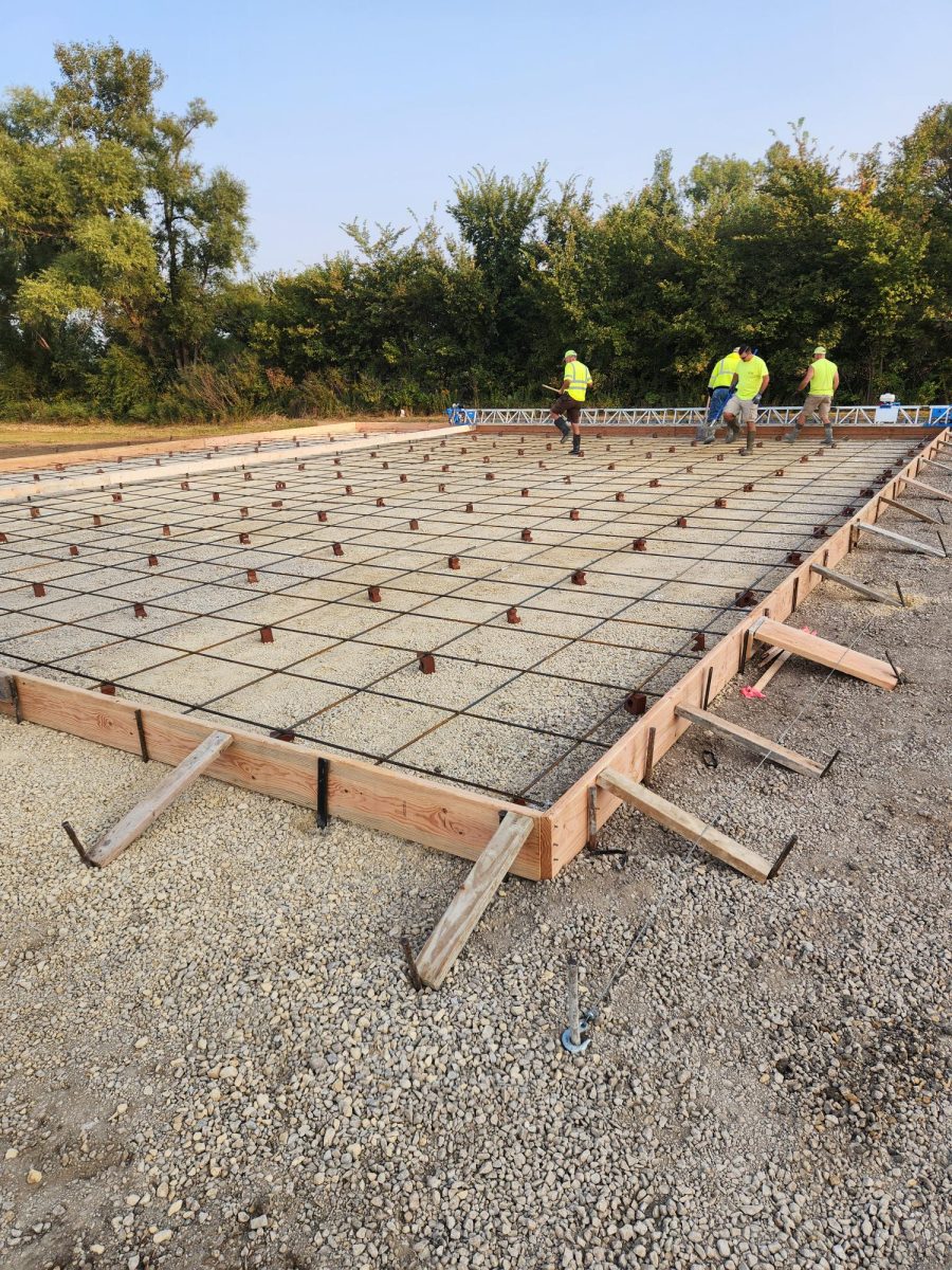 City of Mount Vernon crews work on preparing the concrete pad for the brine storage shed at the Bryant Road site earlier this month.