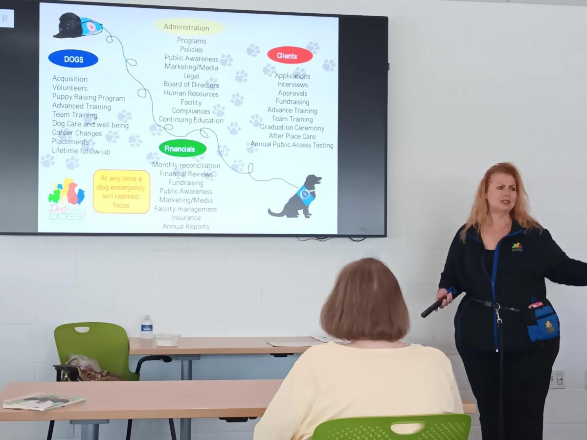 Sherry Ross highlights the organizational chart of
Deafinitely Dogs and what the group routinely takes care of.