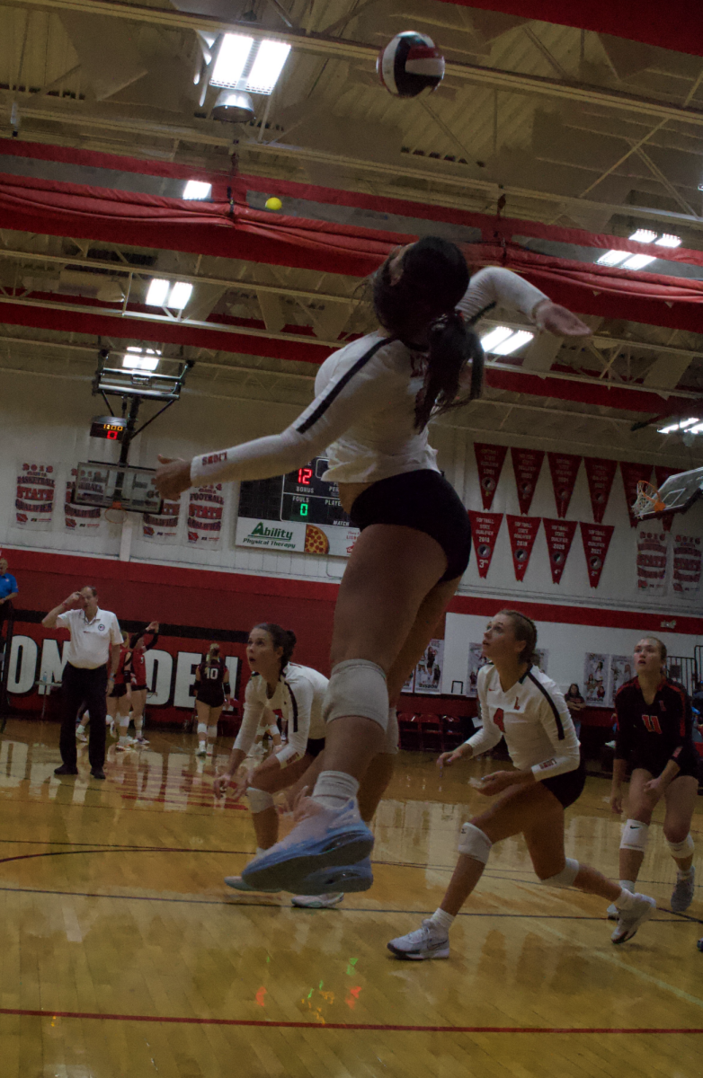 Lisbon volleyball player Sarah Dietsch serves the ball during a match between the Lisbon Lions and the North Linn Lynx on Sept. 5, 2024 at Lisbon High
School. The Lions beat the Lynx, 2-0.