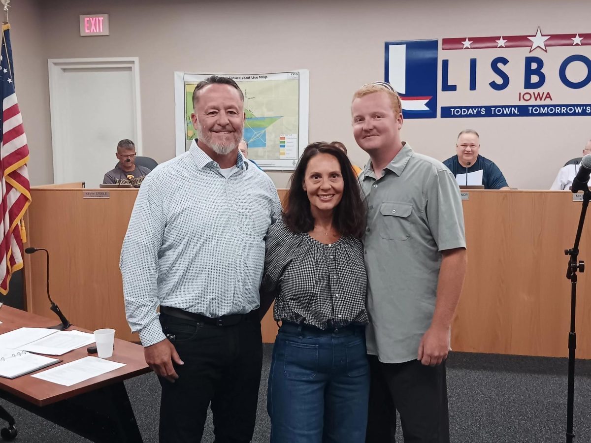 Thad and Jane Nevitt make the $10,000 donation to Lisbon Parks and Recreation director Drayton Kamberling at the Monday, Aug. 26, Lisbon city council meeting.