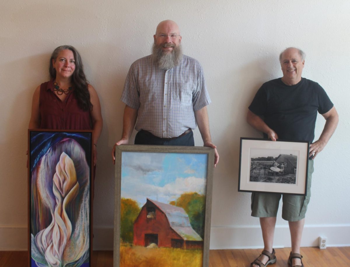 Abbe Creek – Kimberly Machovec-Smith, Chris Childers and Bob Campagna with individual pieces of art they are proud of. The group are finishing up the displays of artwork and other items in the new Abbe Creek Gallery that will be opening this Saturday for the first time.