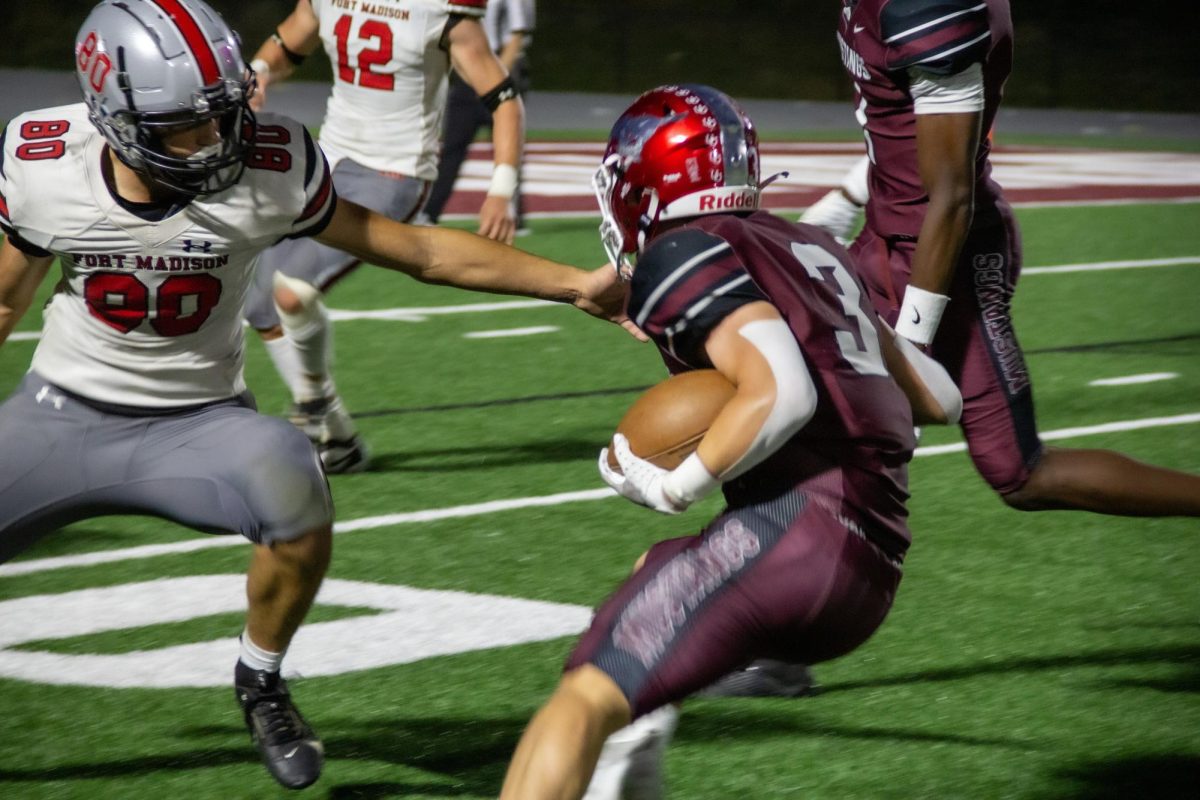 Mount Vernon’s Michael Ryan (No. 3) advances the ball down the field against Fort Madison defenders Friday, Oct. 11.