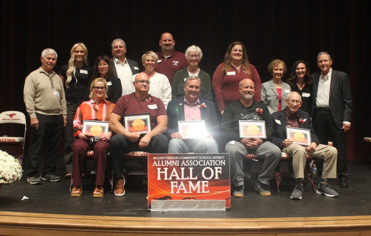 Alumni hall of fame - (Back, from left) Rick Elliott (Mount Vernon School Board president) Paige Schurbon (Mount Vernon student council representative) Rhonda Ewing (nominator of Jude Smith), Dave Ryan (nominator of Wayne Hormann), Judi Hormann (nominator of Wayne Hormann), Jeremy Hotz (nominator of Wayne Hormann), Kathy Bearce (nominator of Rev. James Moore),  Emily Wilkinson Vislisel (nominator of Tom Wilkinson), Gail Yeisley Rhodes (nominator of Bill Yeisley), Sarah Rife Patten (Mount Vernon Alumni Association) and John Rife (master of ceremonies of the hall of fame induction ceremony), (front, from left) Jude Smith (fine arts hall of fame inductee), Wayne Horman (athletics hall of fame inductee), Lt. Col Robert Moore (accepting the service hall of fame for his late father, Rev. James Moore), Tom Wilkinson (community impact hall of fame inductee), Bill Yeisley (achievement hall of fame inductee). 