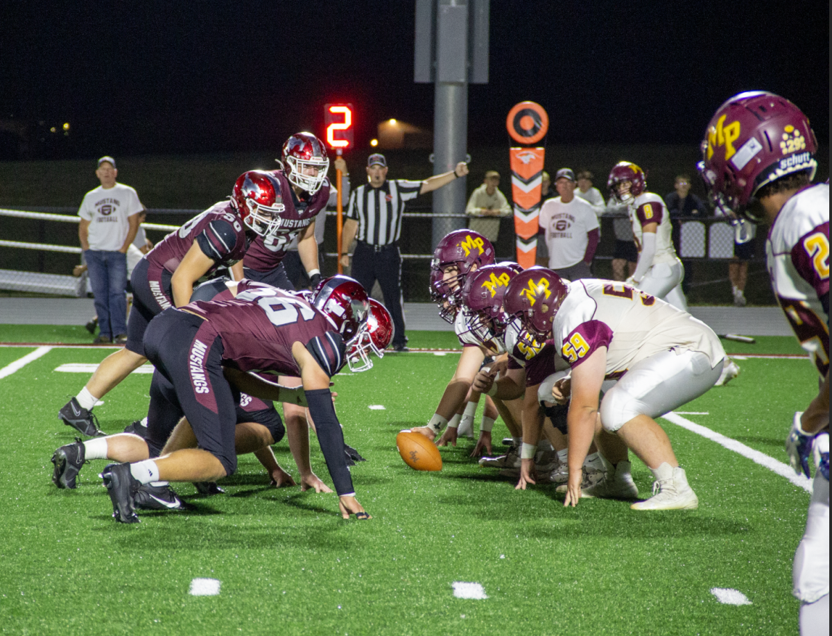 The Mount Vernon defensive line gets ready to go during a homecoming game Friday, Sept. 27. 