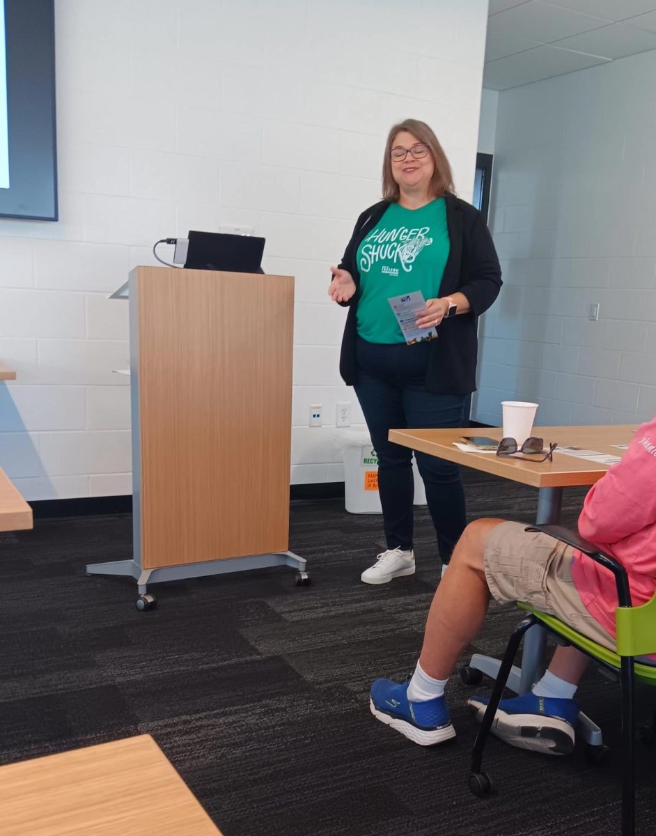 Kim Guardado of HACAP’s food reservoir discusses the work of the agency throughout their nine county region and the work to fight food insecurity at the Lester Buresh Family Community Wellness Center Thursday, Oct. 3.