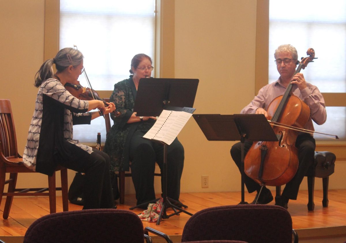 Meara Kim (violinist), Christine Bellomy (guest artist and clarinetist) and Carey Bostian (cello) perform at Lisbon Heritage Hall Saturday, Sept. 28.