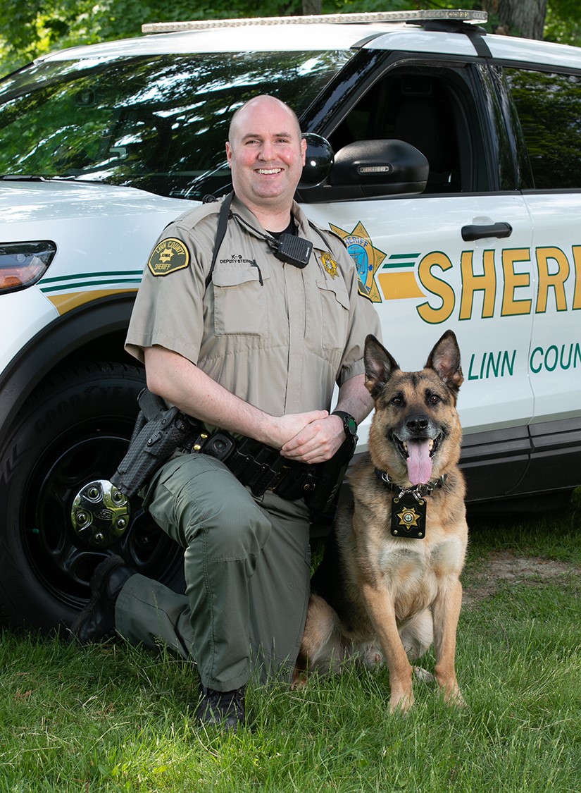 Deputy Derek Steines and retiring K-9 officer Bingo. 