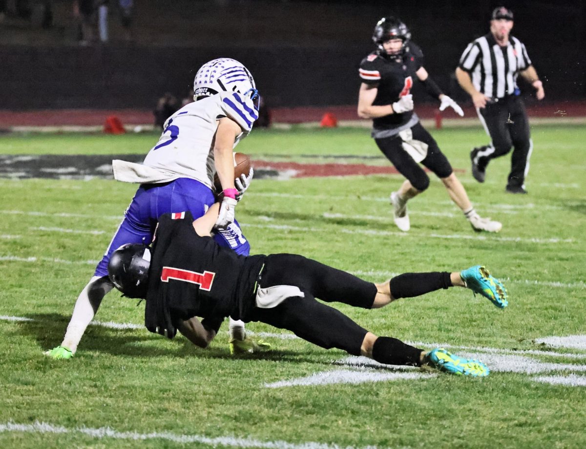 Lisbon’s Dakota Clark (No. 1) tackles a defender earlier in the season. 