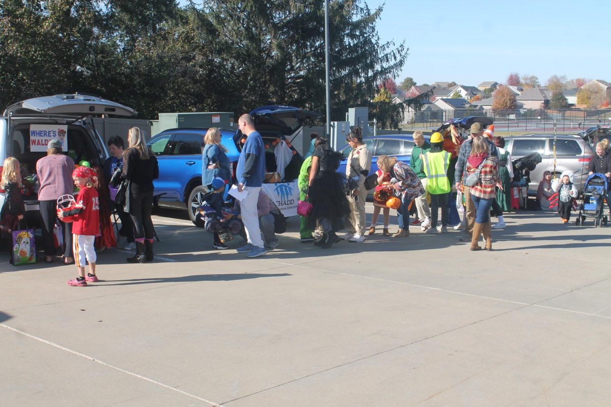 Steady crowds line up to the Trunk or Treat event Sunday, Oct. 27.