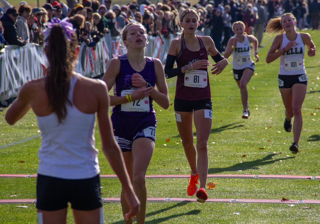 Evelyn Moeller finishes in tenth place during the state meet. Moeller finished in 18:59. 