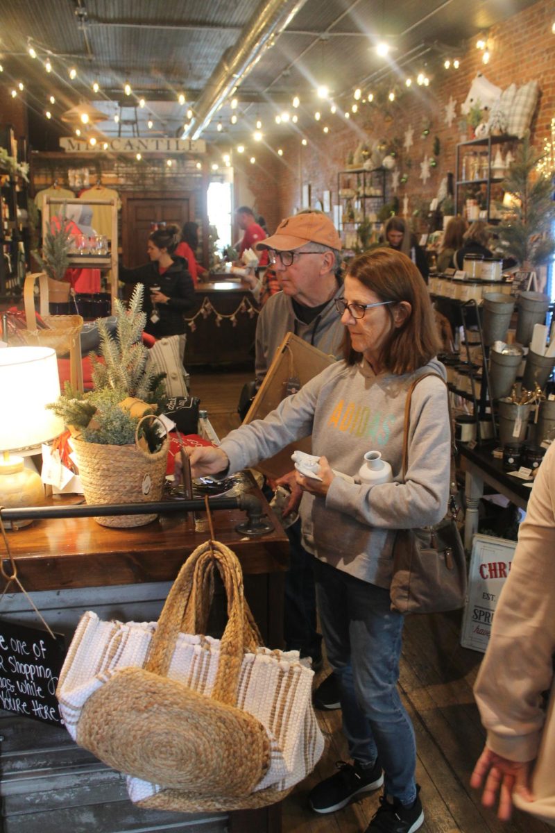 Shoppers at The Local look at pieces of holiday décor that were on sale Saturday, Nov. 9.