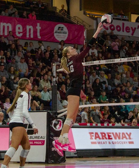 Mount Vernon’s Chloe Meester (No. 16) spikes down a ball at the state tournament. Meester was named player of the year in Iowa this year, as well as Class 3A player of the year.