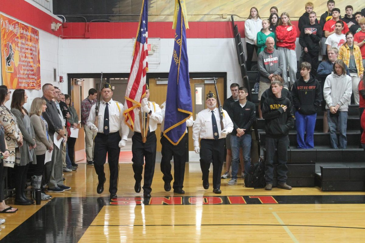 Members of the Lisbon Cyclops Post march the colors into place at Lisbon Monday, Nov. 11, ahead of the Veterans Day ceremony.