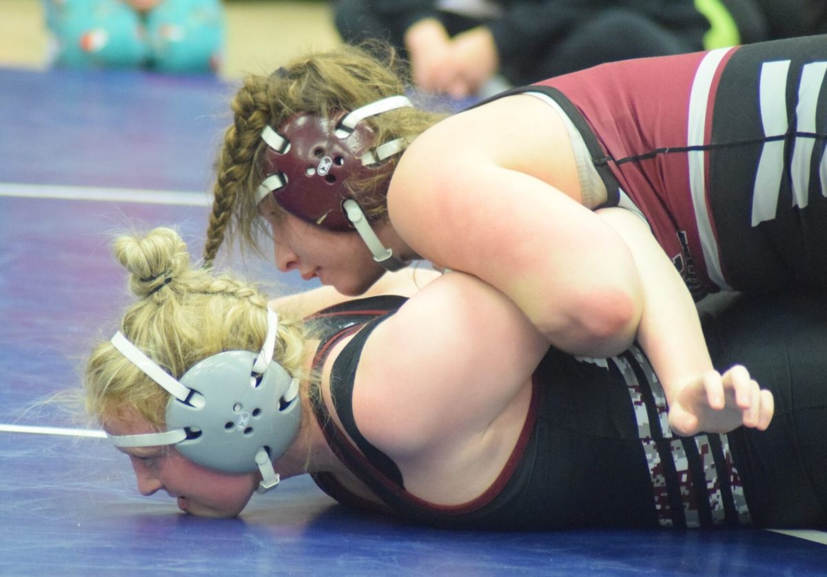 Mount Vernon’s Libby Dix dominates an opponent from last season. Dix placed first in 190 pounds at Wilton.