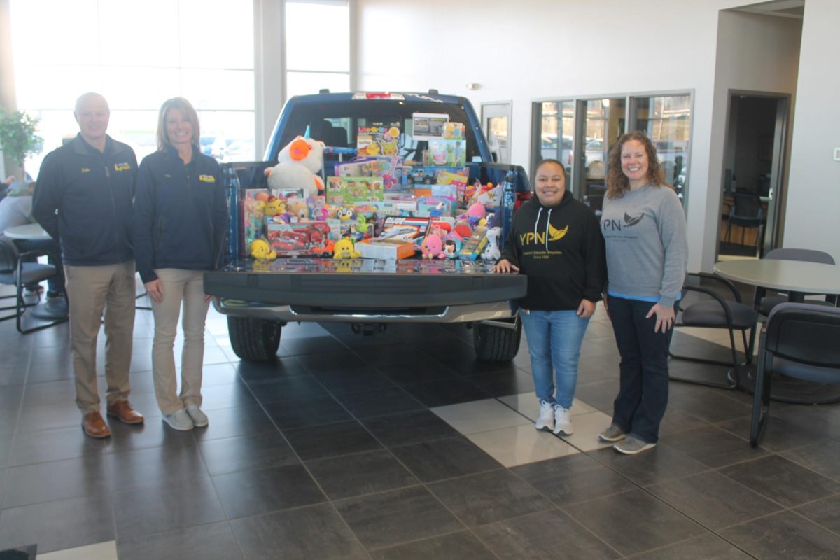 Pictured in photo below, from left: John Walz (general manager of Lynch Ford-Chevrolet), Lisa Lansing (Lynch Ford-
Chevrolet), Tasia Davidson (Young Parents Network) and Kim Hanna (Young Parents Network) with the collected toys donated to the Young Parents Network.