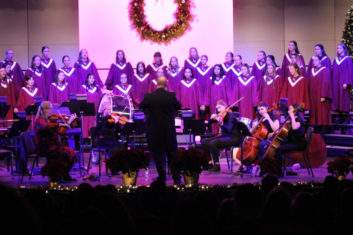 The combined choirs join together to sing the closer “Let There Be Peace on Earth.”