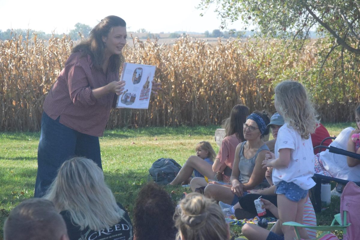 Meredith Nehring reads “Nell Plants a Tree.”