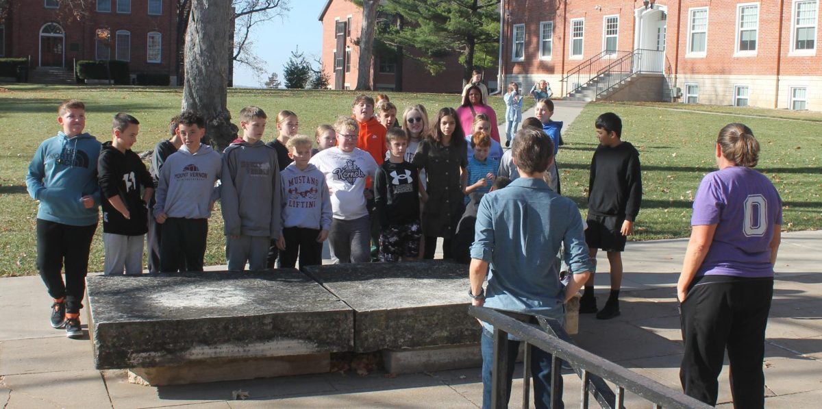 Students from Dee Winder’s morning science classes visit the Norton Geology Center on Cornell College campus Friday, Nov. 14. Below: Cornell College professor Emily Walsh touches on plate tectonics during the tour.