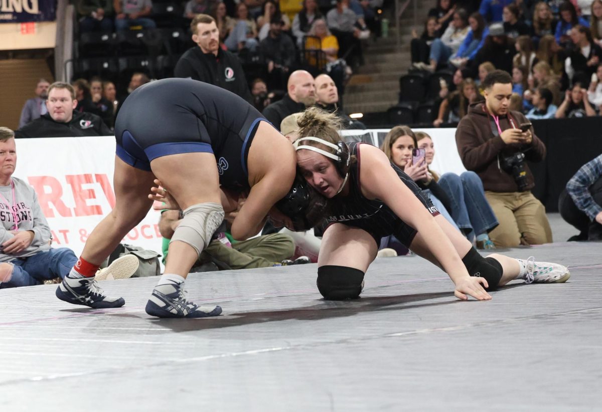 Mount Vernon’s Gracie Pinckney tries to find an opening against West Liberty’s Bricsia Garcia-Vasquez in the championship match Friday, Feb. 6. Pinckney was state champion at 170 pounds in Class 1A at the tournament.