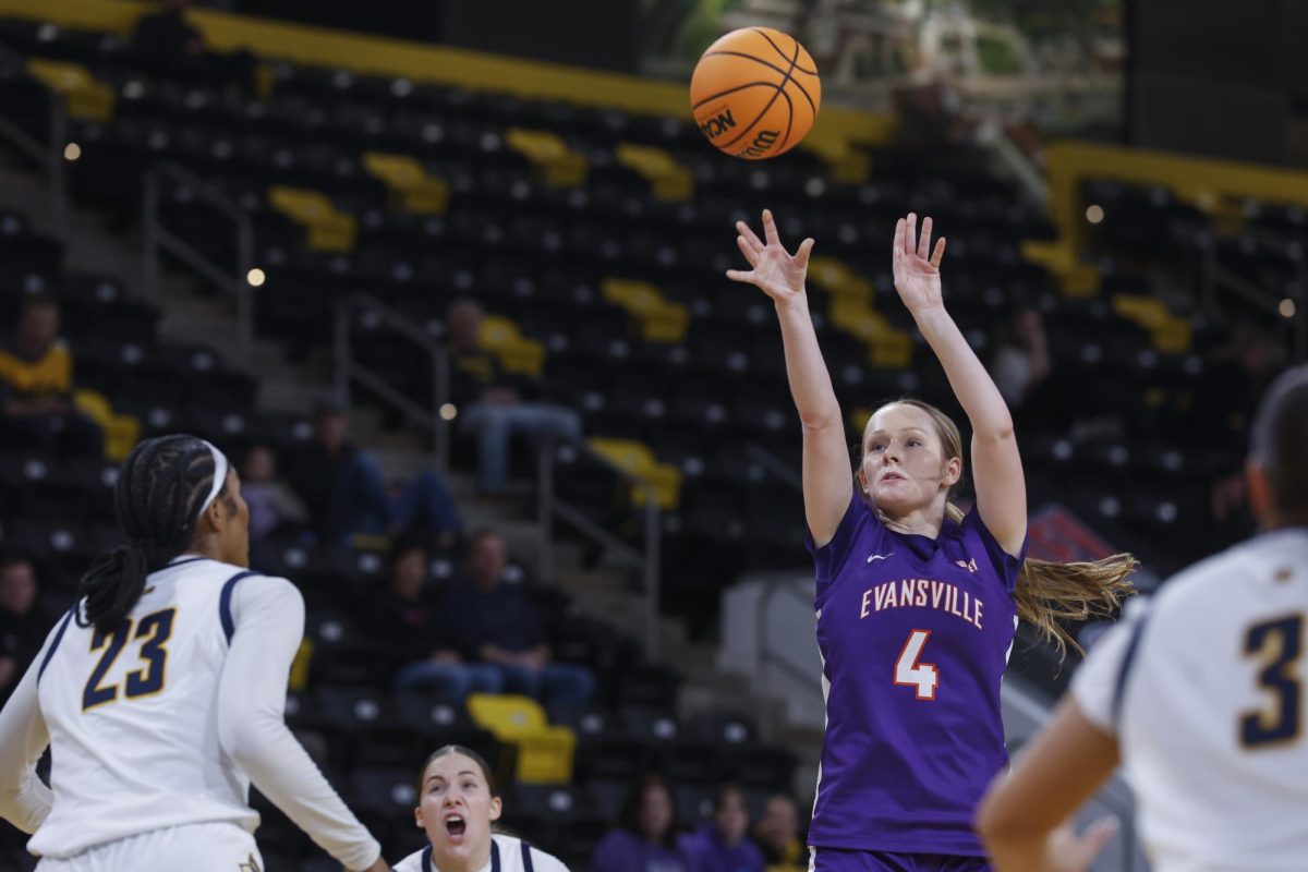 Evansville’s Sydney Huber (4) takes a shot over Murray State’s Sharnecce Currie-Jelks (23) during their championship game at the 2026 Missouri Valley Conference women’s basketball tournament at Xtream Arena in Coralville, on Sunday, March 15. Murray State won 91-70.