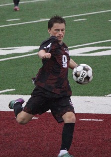Mount Vernon’s Carter Gadberry (No, 9) winds up to push the ball downfield. Gadberry scored the tying goal with Grinnell Thursday, April 9.