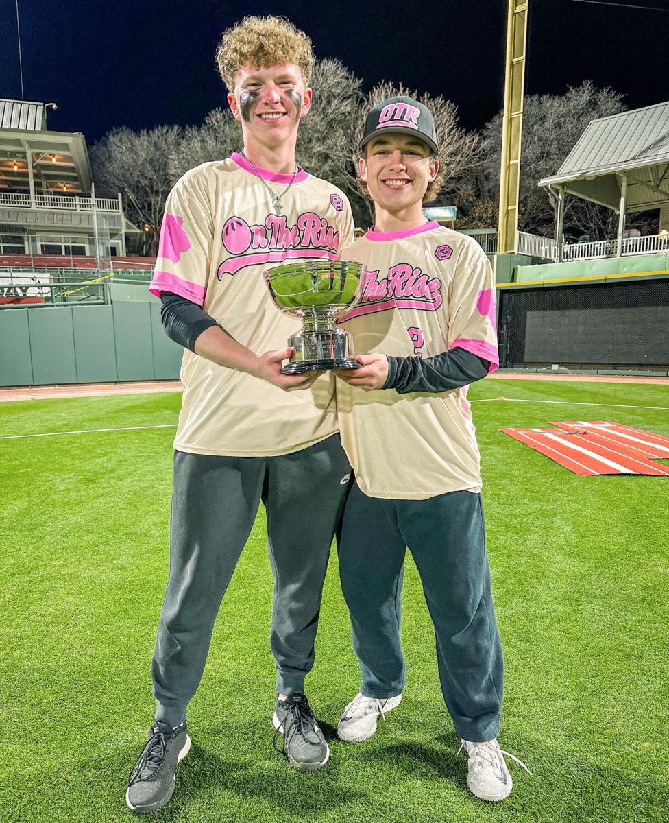 Cael Foreman and his friend, Connor Smith, after their first tournament win in Dallas, Texas.