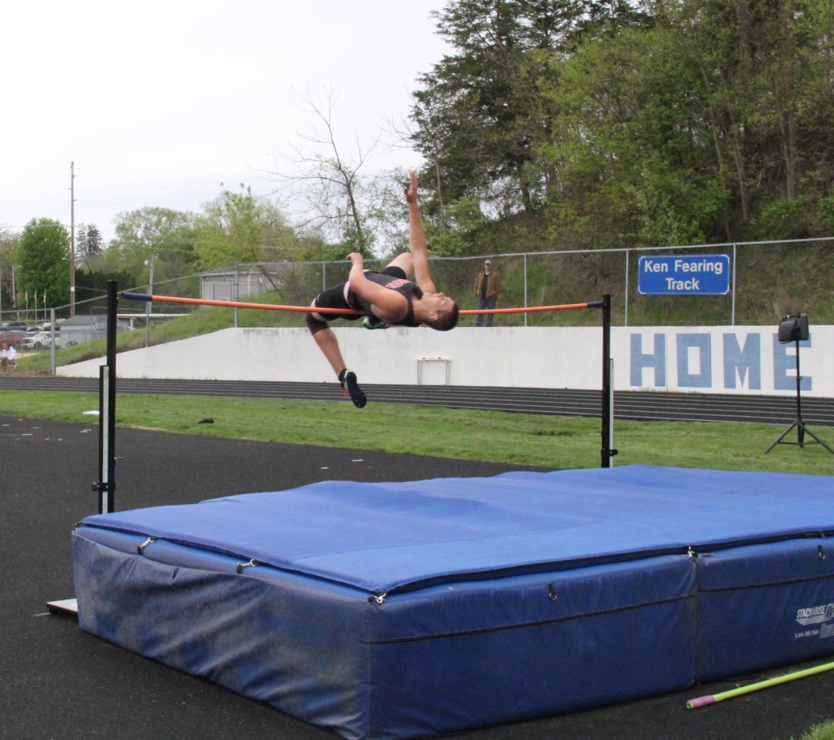 Lisbon athlete Justin Snyder attempts to jump over the beam for high jump. At the Anamosa Co-Ed he finished first out of all high jumpers with a 6’0 foot jump.
