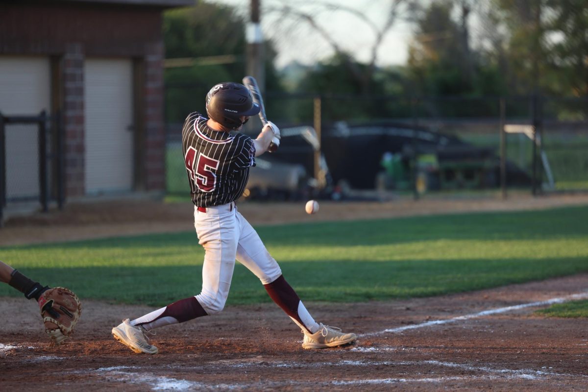 Mount Vernon’s Cole McDermott gets a bit of the ball at bat at Ash Park Monday, June 22, against Vinton-Shellsburg.